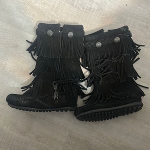 Size: 7 toddler Minnitonka boots never worn.
